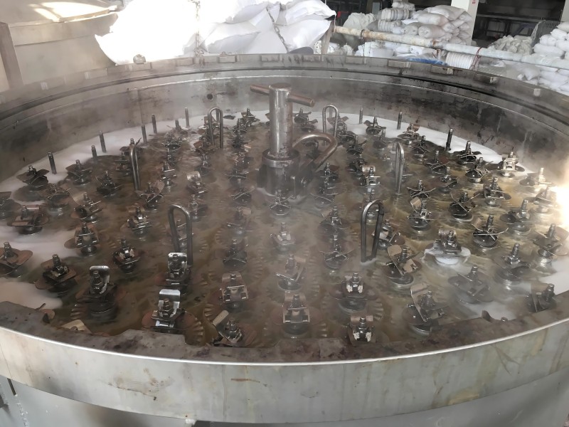 Top view of package yarn dyeing vessel and liquor circulation condition